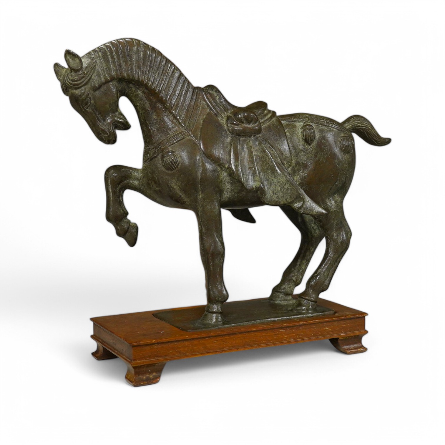 A Chinese bronze figure of a horse, Tang style, signed to the base, 24cm high. Condition - good